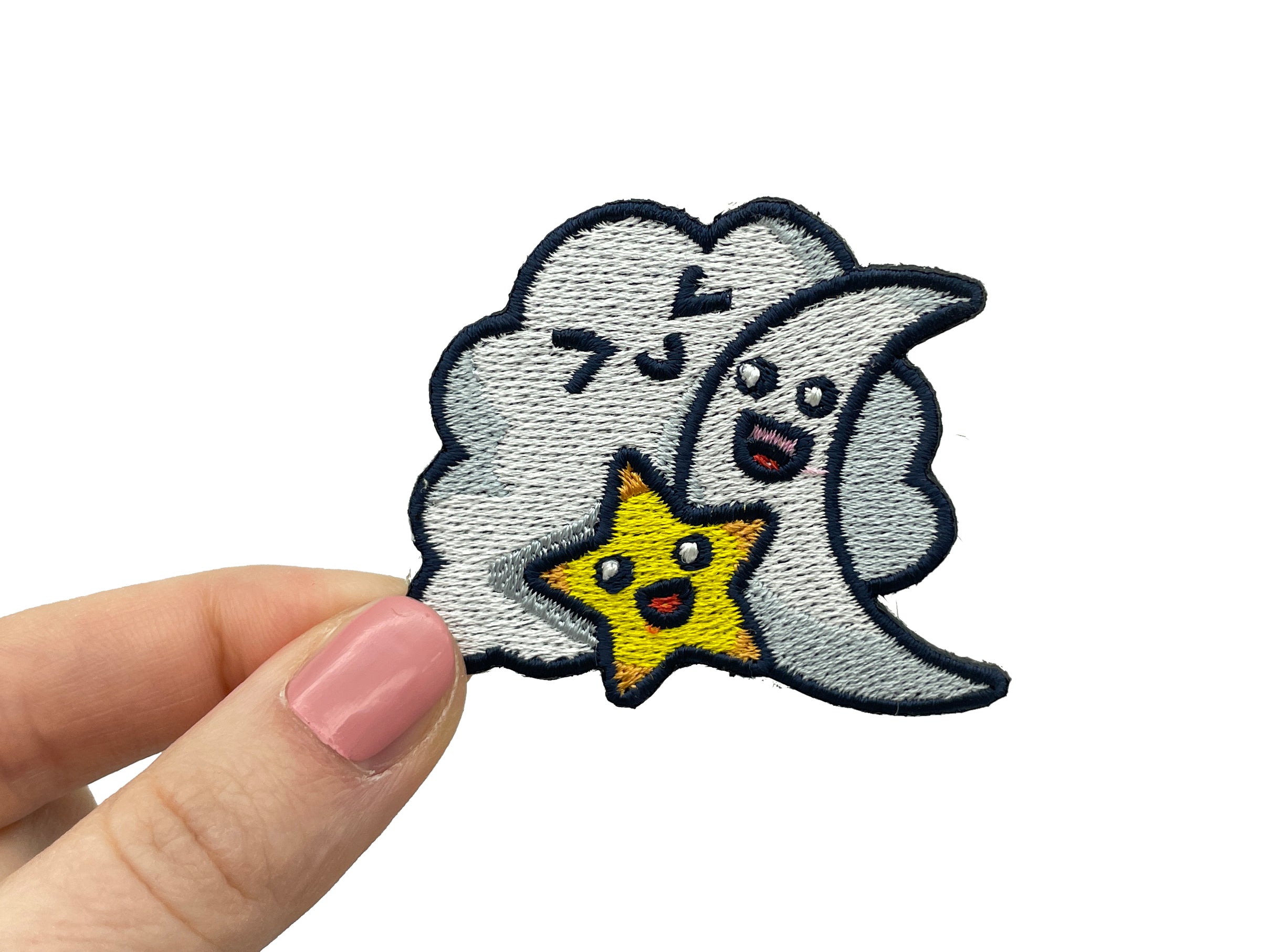Frauenhand hält den Wolke, Mond und Stern Patch