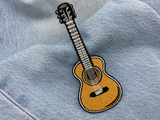 Gitarre Patch auf blauer Jeans