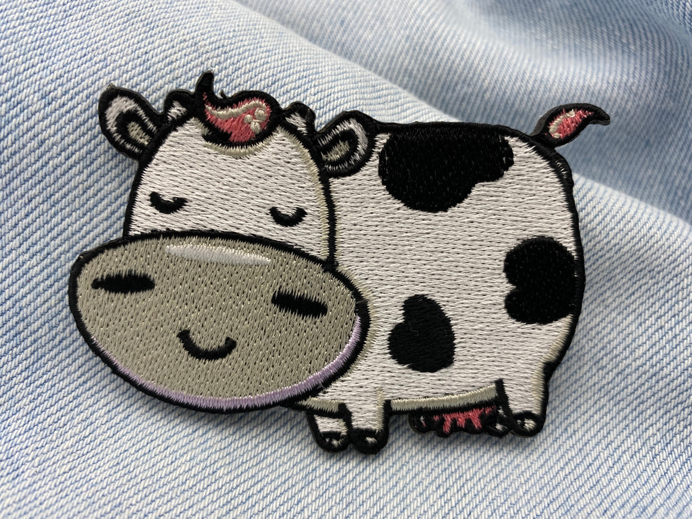 Kuh Patch auf hellblauer Jeans