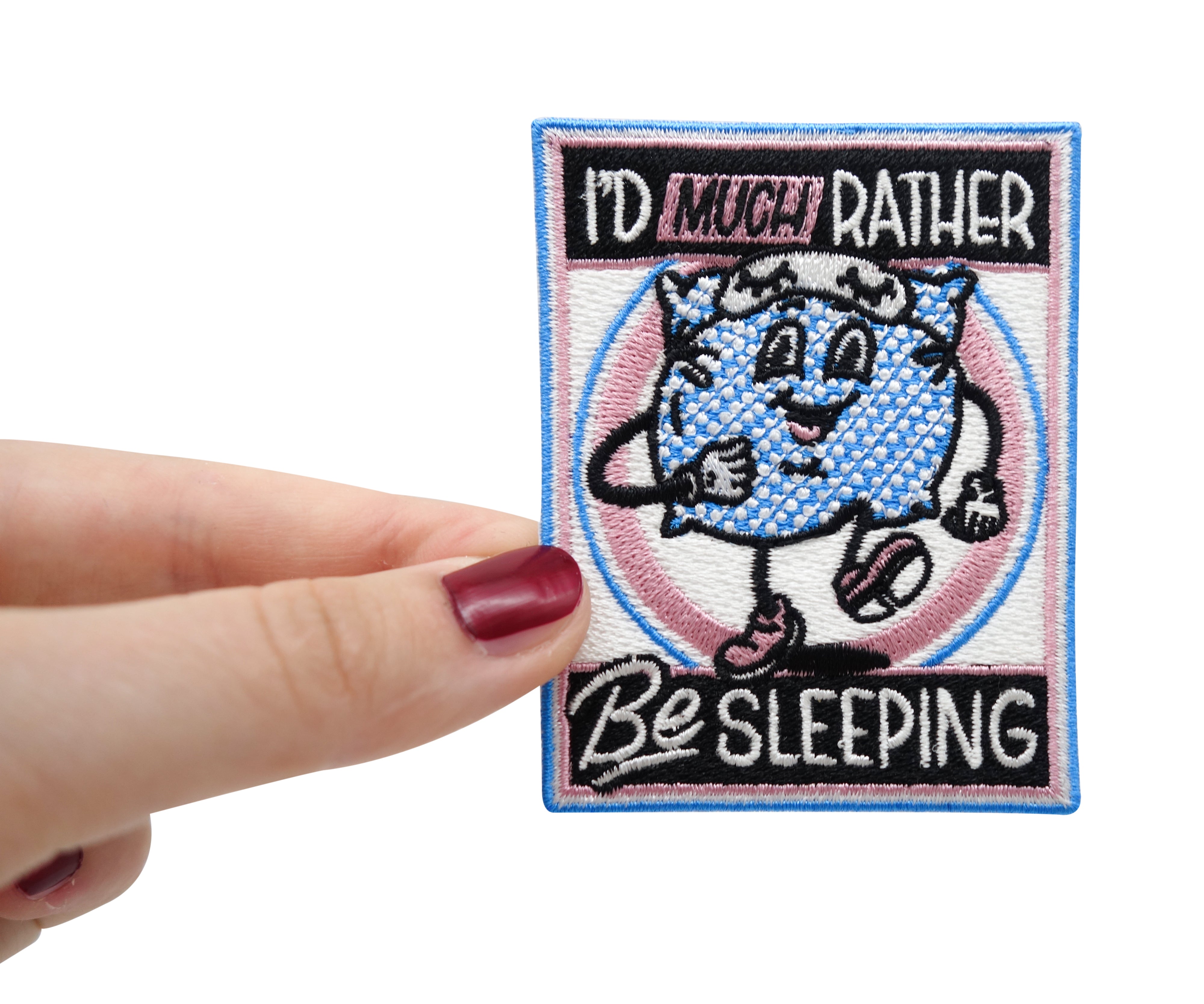 Frauenhand hält den Schlafmützen Patch