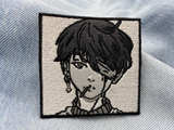 Korean Boy Patch auf hellblauer Jeans