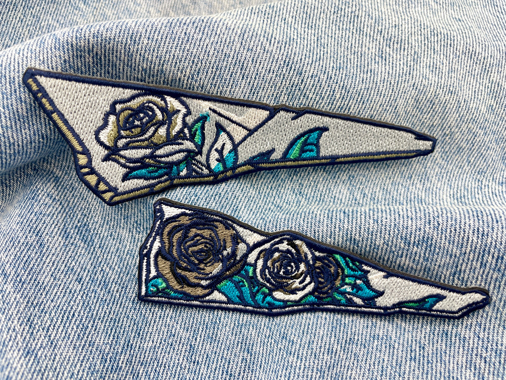 Glasscherben Patches auf blauer Jeans