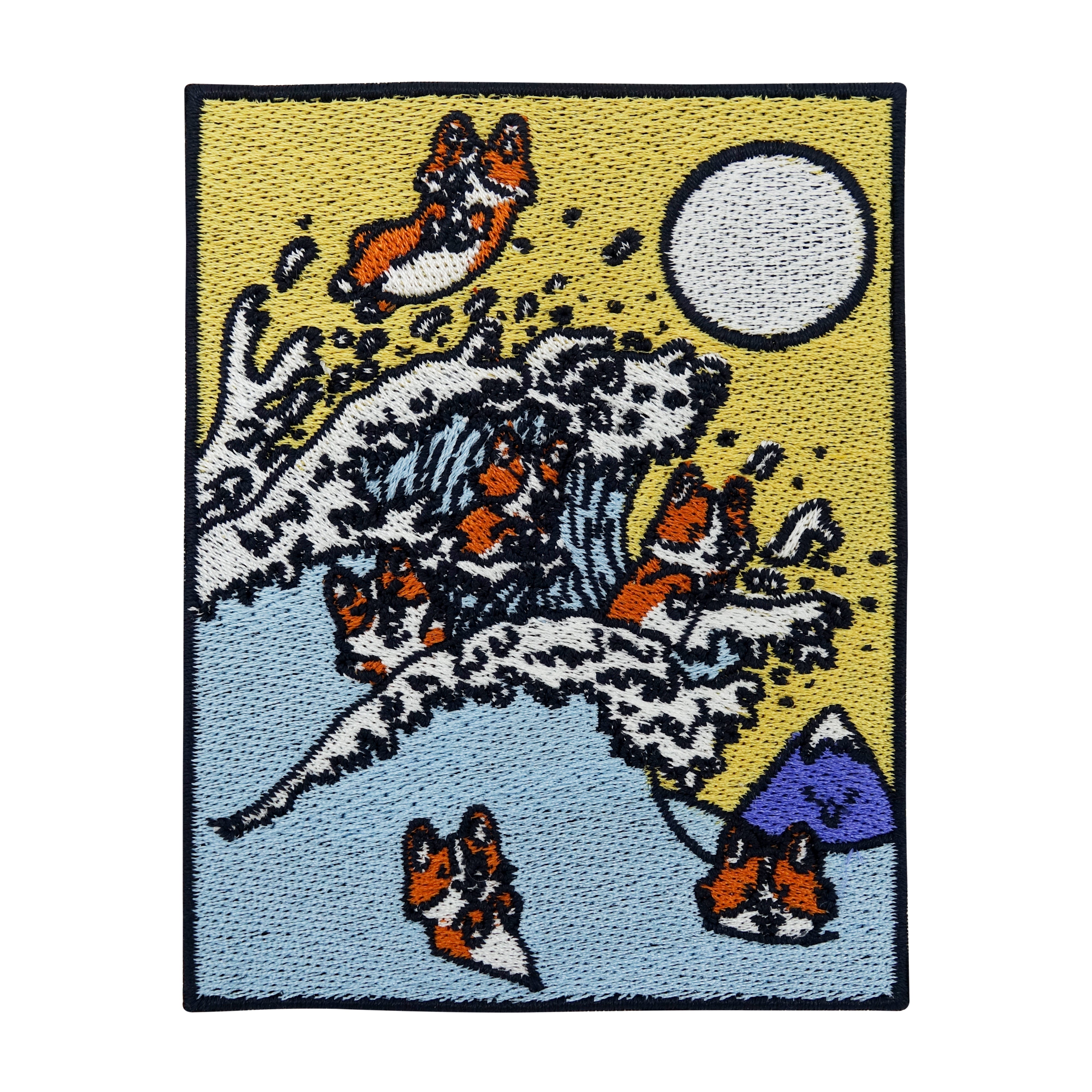Blau-gelber Welpen reiten auf einer Welle Patch