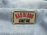 Bad Blood Ticket Patch auf hellblauer Jeans