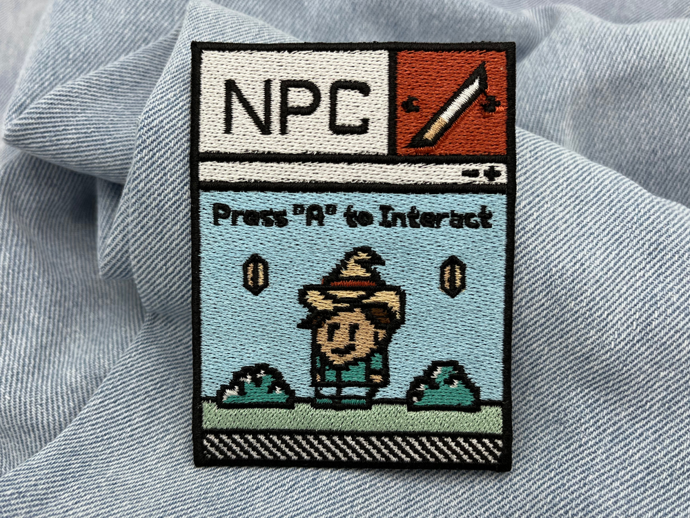 NPC Patch auf hellblauer Jeans