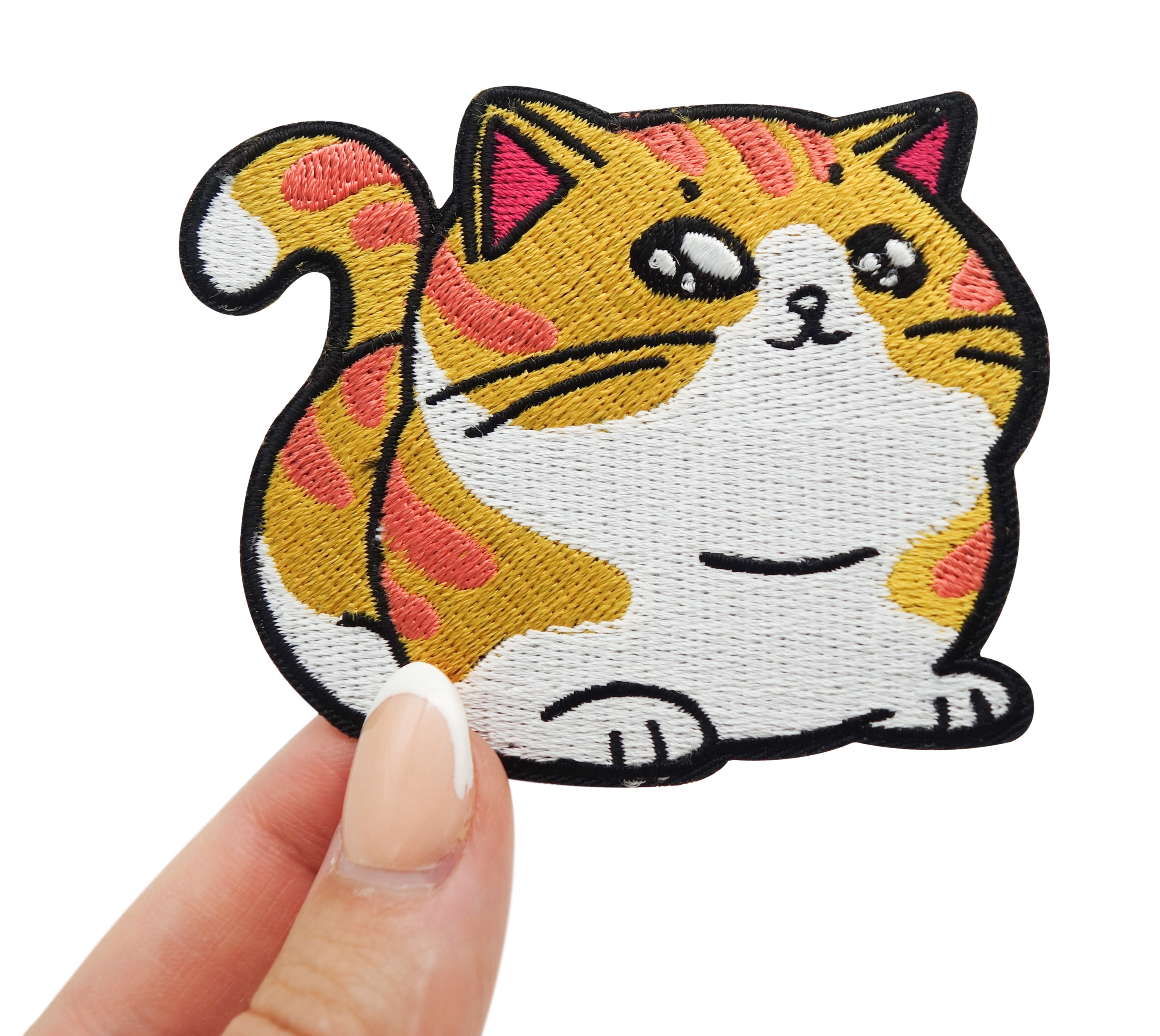 Frauenhand hält den dicke Katze Patch