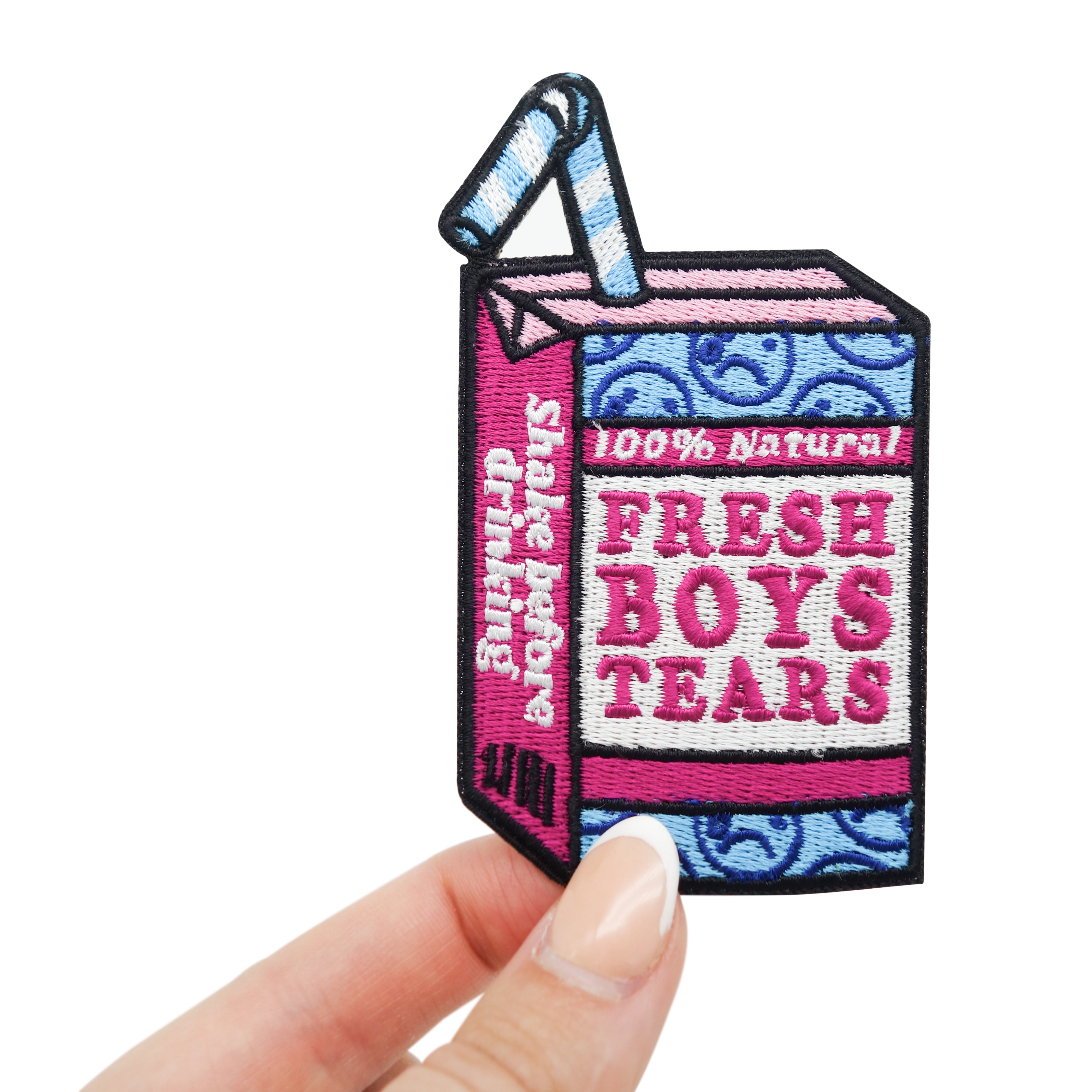 Saft Packung Patch gehalten von einer Frauenhand 
