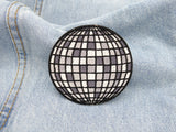 Discokugel Patch auf hellblauer Jeans