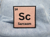 Sarcasm Patch auf hellblauer Jeans