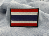 Thailand Klettpatch auf hellblauer Jeans