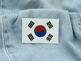 Südkorea Patch auf hellblauer Jeans