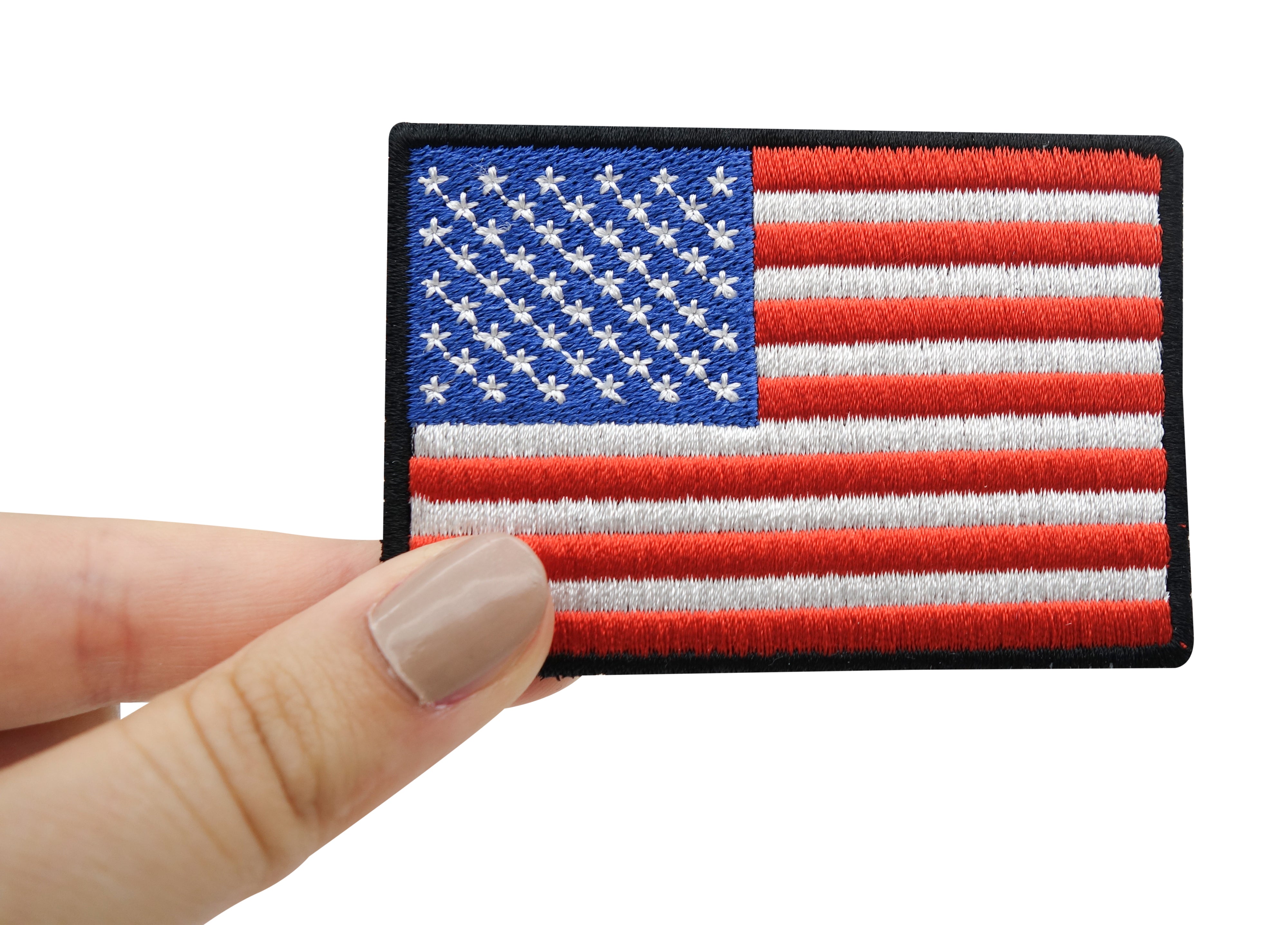 Frauenhand hält USA Klett Patch